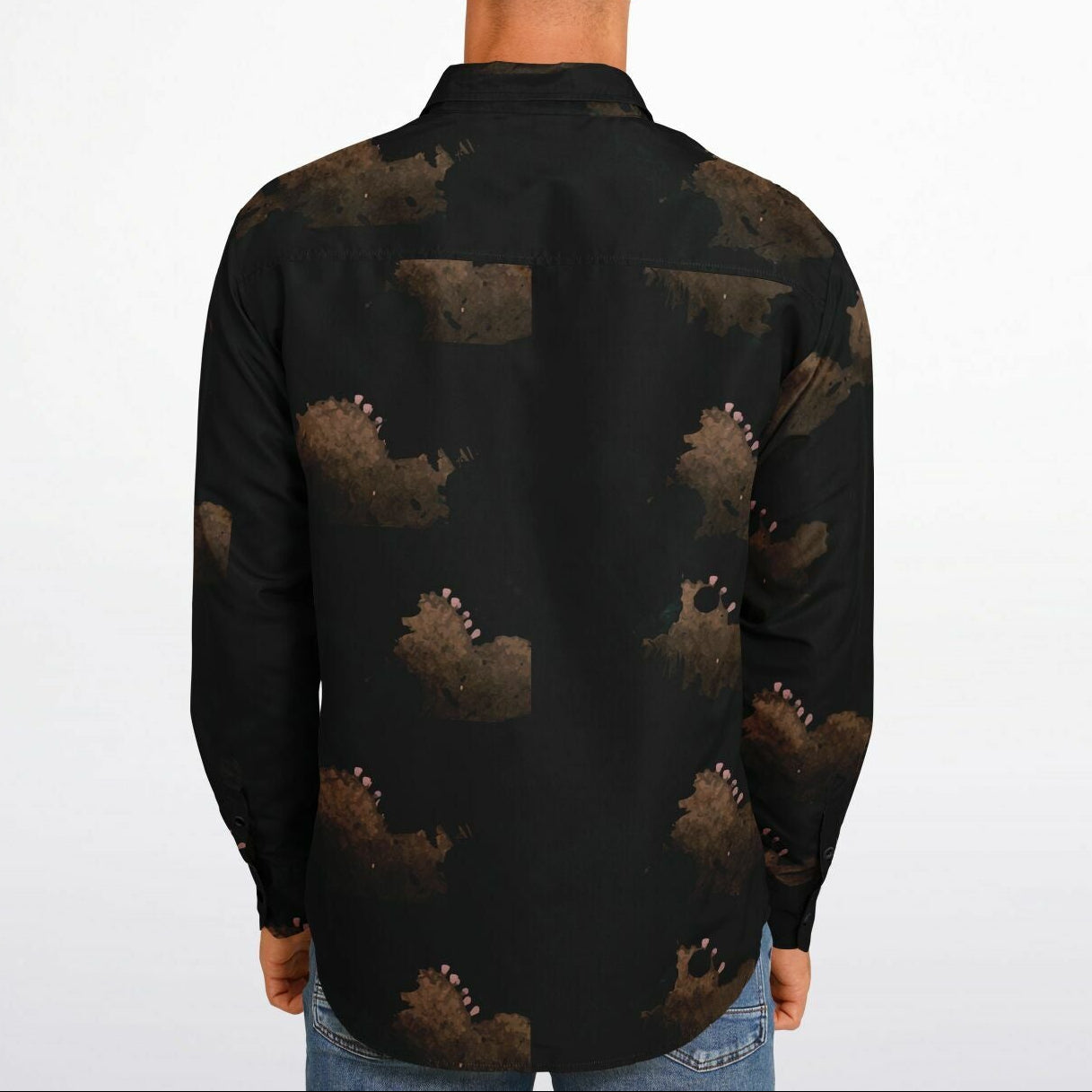 Man wearing a black patterned shirt on a white background
