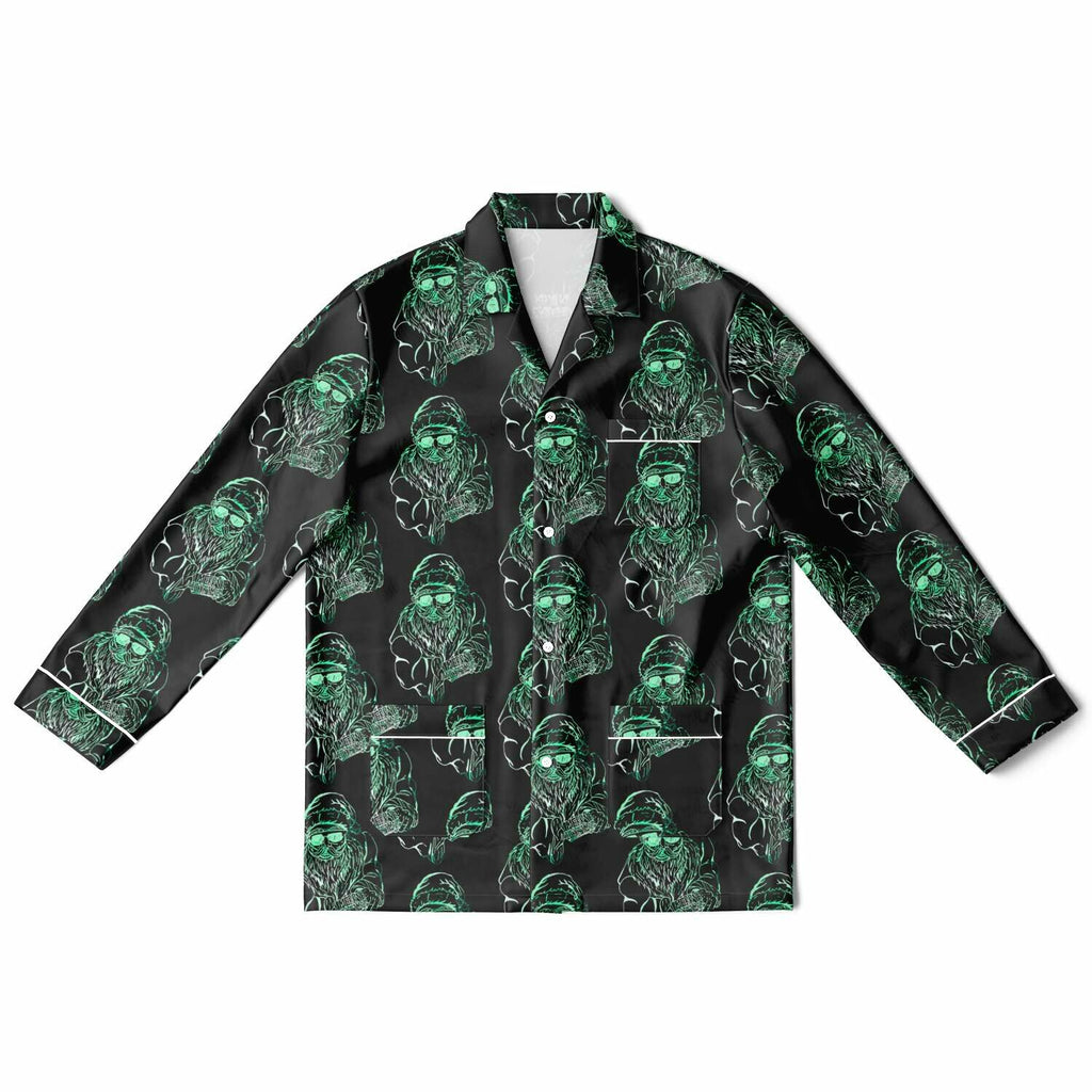 Black shirt with green alien pattern on a white background