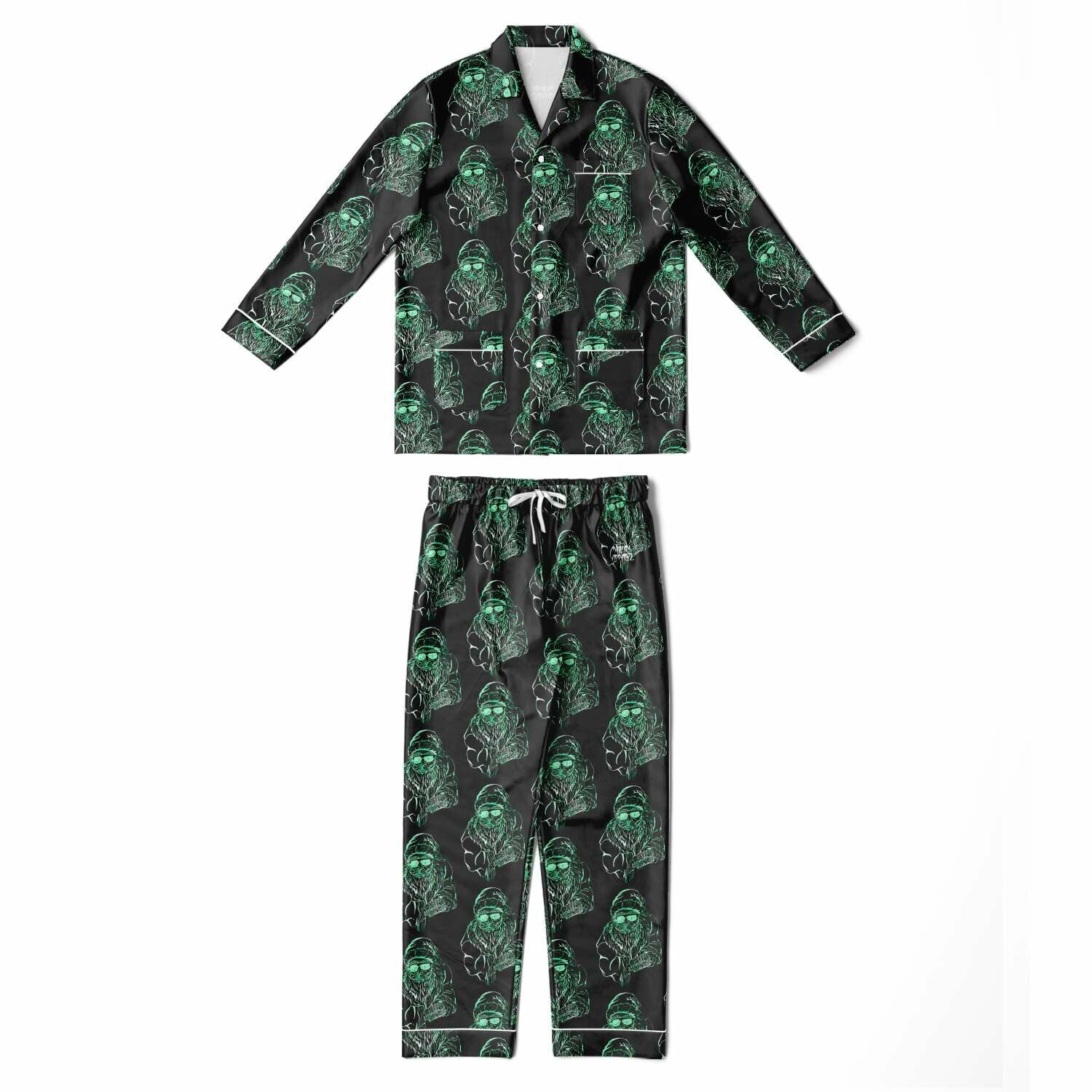 Pajama set with green skull pattern on a black background