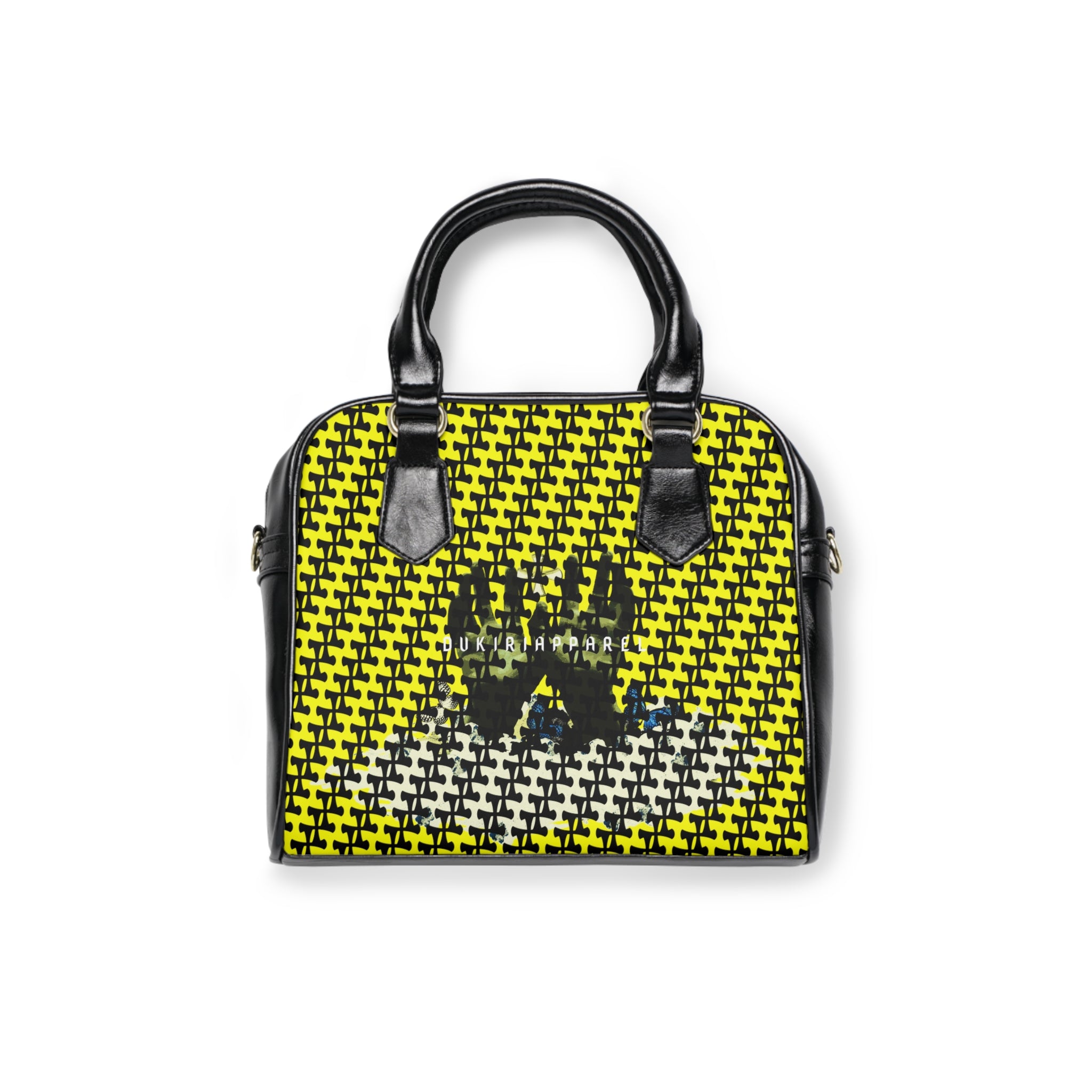 A shoulder handbag with a black and yellow checkered pattern, featuring a graphic of three figures on the front.