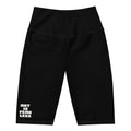 Black pants with 'Art is Fear Less' text on a white background