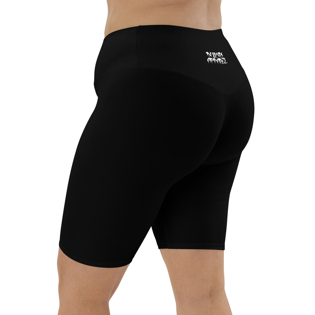 Black athletic shorts with a logo on the back against a white background
