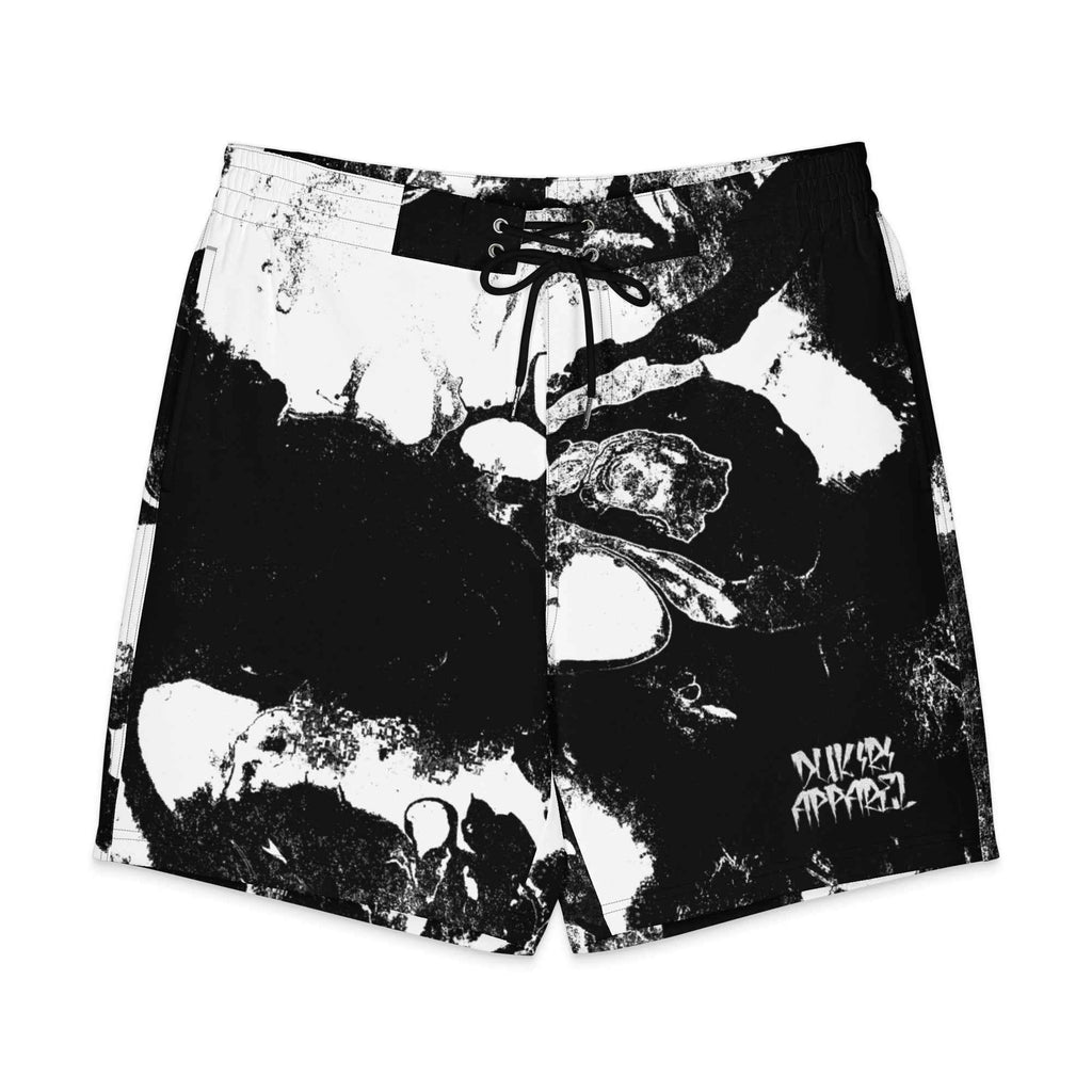 Black and white graphic shorts with abstract design on a white background