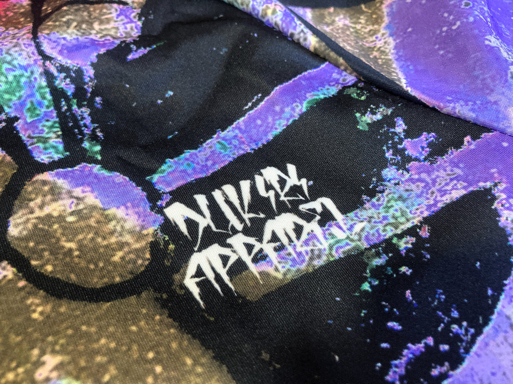 Black bag with 'Nike Air' branding on a colorful, abstract background