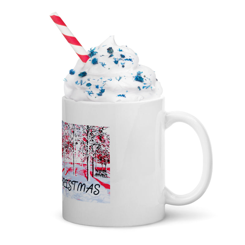 White mug with festive design, whipped cream, and a straw on a white background