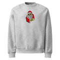 Gray sweatshirt with a graphic of Santa Claus holding a gift on a white background